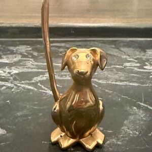 Gold-toned dog ring holder, 3.5 inches tall